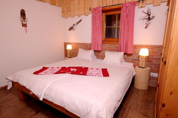Slaapkamer van Almchalet Dorfblick