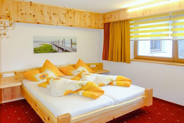 Slaapkamer bij Chalet Am Trogwohl