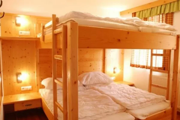 slaapkamer bij Chalet Amade