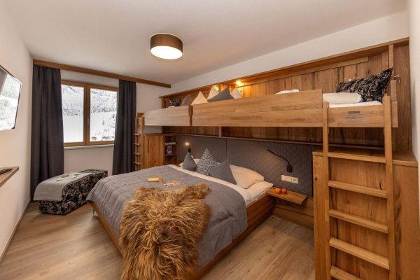 Slaapkamer van Chalet Bachgut 1 hinterglemm