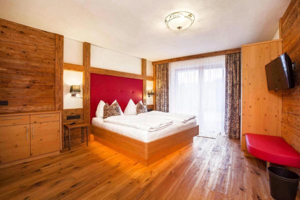 Slaapkamer bij Chalet Edelweissalm