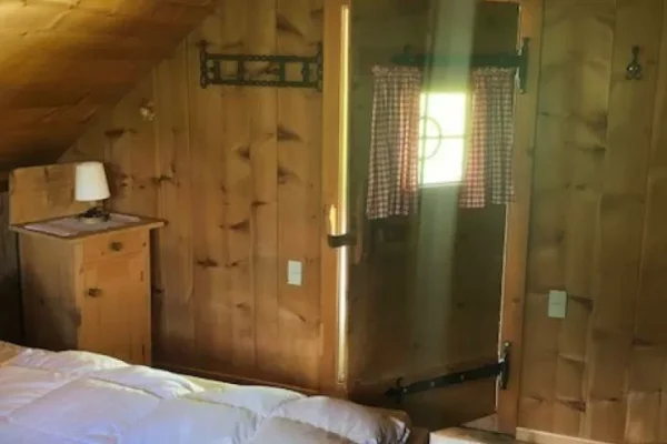 slaapkamer bij Chalet Hexenhäuschen