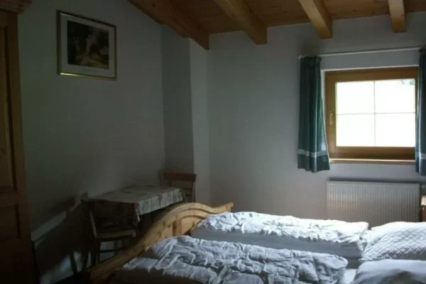 slaapkamer bij Chalet Hochlandhäusl