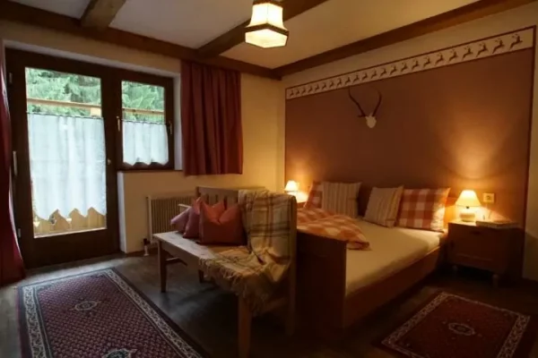 Slaapkamer bij Chalet Landhaus Daringer