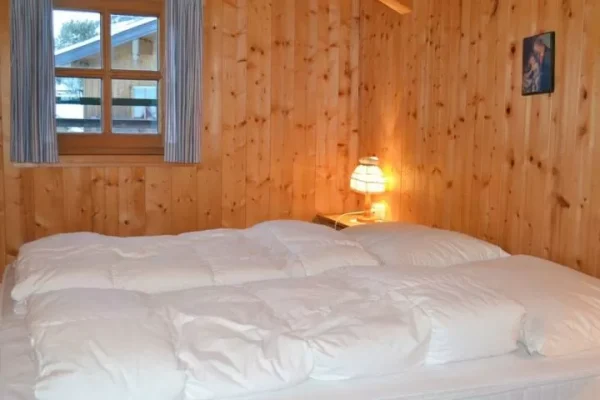 slaapkamer bij Chalet Stallerhütte