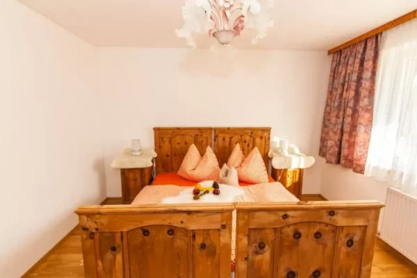 slaapkamer bij Chalet Stollenberghutte