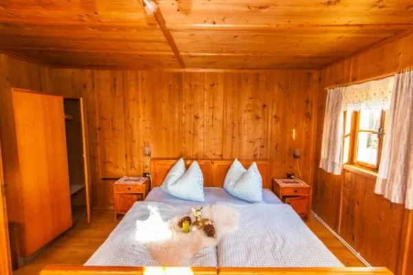 slaapkamer bij Chalet Stollenberghutte