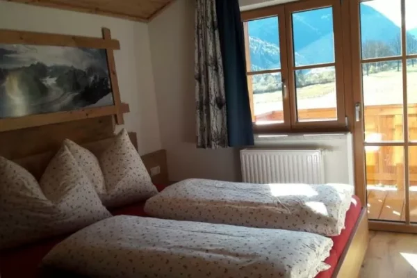 slaapkamer bij Chalet Toni Hausl