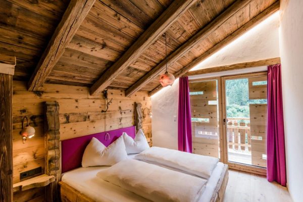 Slaapkamer bij Chalet Wildberg