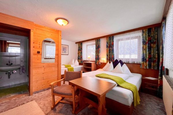 Slaapkamer bij Chalet Willi