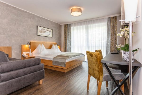 Slaapkamer van Hotel Almrausch